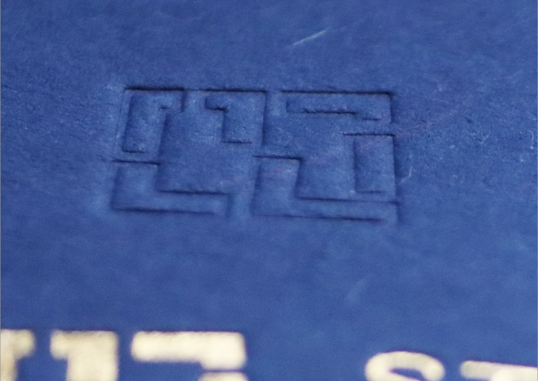 Das geprägte Icon eines Logos.